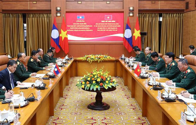 Vietnam y Laos fortalecen cooperación entre fuerzas militares ảnh 2 Vietnam y Laos fortalecen cooperación entre fuerzas militares ảnh 2