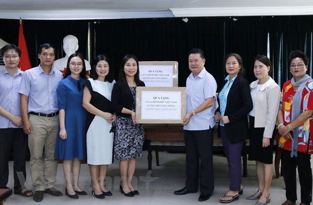 Apoyan a comunidad vietnamita en Laos para prevenir contra el COVID-19 ảnh 1 Apoyan a comunidad vietnamita en Laos para prevenir contra el COVID-19 ảnh 1