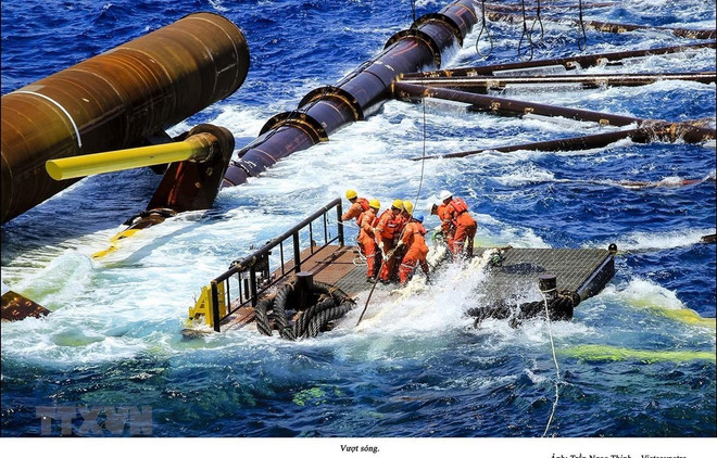 Celebran en Ciudad Ho Chi Minh exposición fotográfica sobre mares e islas de Vietnam ảnh 1