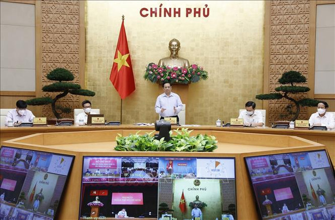 Gobierno de Vietnam evalúa implementación de medidas contra el COVID-19 ảnh 1 Gobierno de Vietnam evalúa implementación de medidas contra el COVID-19 ảnh 1