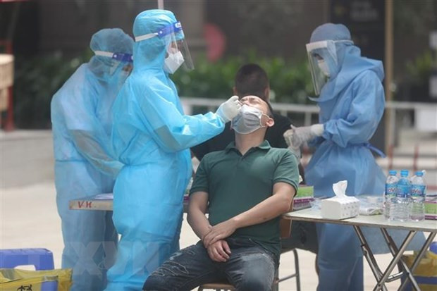 Vietnam registra leve disminución de casos del COVID-19 ảnh 1