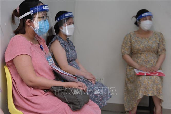 Implementa Ciudad Ho Chi Minh vacunación contra COVID-19 para embarazadas ảnh 1 Implementa Ciudad Ho Chi Minh vacunación contra COVID-19 para embarazadas ảnh 1