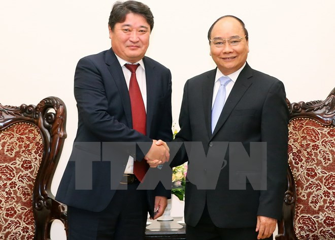 Premier de Vietnam recibe al saliente embajador de Mongolia ảnh 1