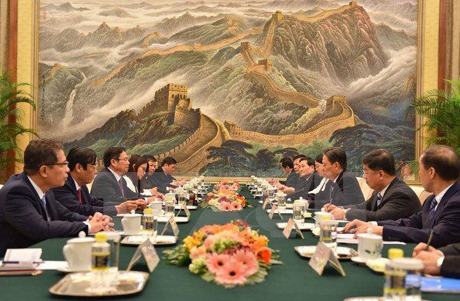 Vietnam confirma política coherente de fomentar nexos con China ảnh 1 Vietnam confirma política coherente de fomentar nexos con China ảnh 1