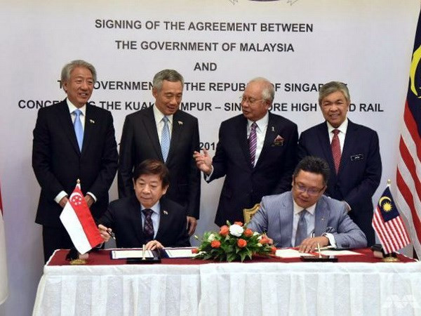 Malasia y Singapur firman acuerdo de ferrocarril de alta velocidad ảnh 1 Malasia y Singapur firman acuerdo de ferrocarril de alta velocidad ảnh 1