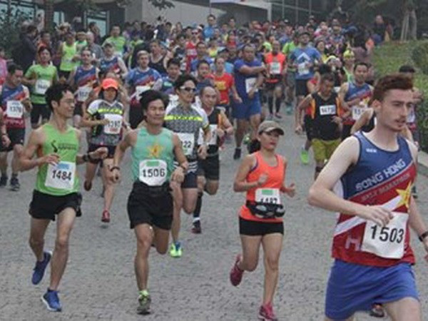 Nutrida participación en carrera en Hanoi por animales silvestres ảnh 1 Nutrida participación en carrera en Hanoi por animales silvestres ảnh 1