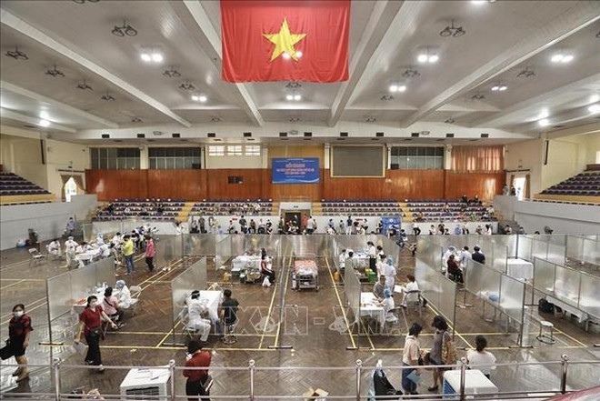 Mirada retrospectiva a logros de Vietnam tras un año del despliegue de mayor campaña de vacunación ảnh 5