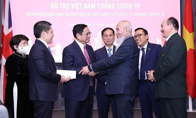 Premier vietnamita se reúne con connacionales residentes en Reino Unido ảnh 1 Premier vietnamita se reúne con connacionales residentes en Reino Unido ảnh 1
