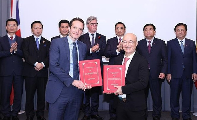 Primer ministro vietnamita presencia firma de acuerdos con Reino Unido ảnh 1 Primer ministro vietnamita presencia firma de acuerdos con Reino Unido ảnh 1