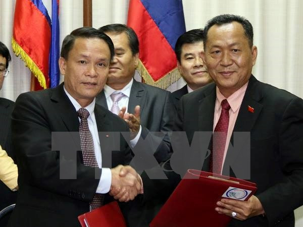 Agencias vietnamitas y laosianas de noticias fortalecen cooperación ảnh 1 Agencias vietnamitas y laosianas de noticias fortalecen cooperación ảnh 1