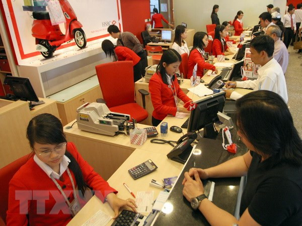 Aplican tecnologías 4.0 en sector bancario de Vietnam ảnh 1