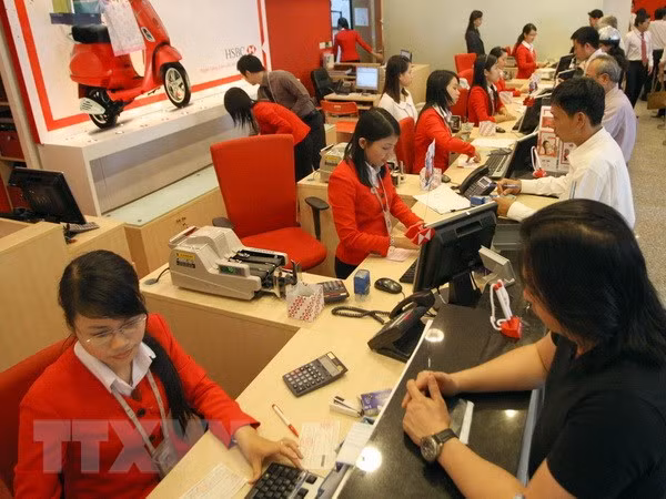 Aplican tecnologías 4.0 en sector bancario de Vietnam ảnh 1
