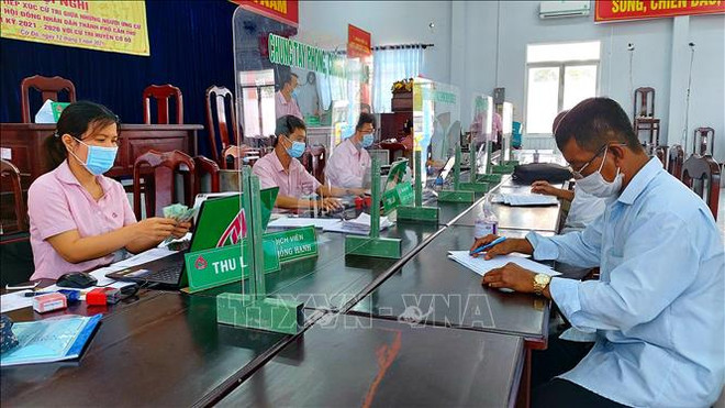 Desembolsan préstamos crediticios a dos millones de personas vietnamitas en 2021 ảnh 1 Desembolsan préstamos crediticios a dos millones de personas vietnamitas en 2021 ảnh 1