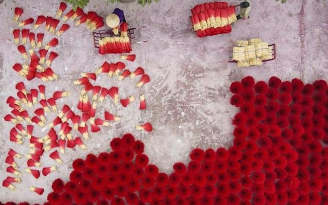 Agencia francesa impresionada con el jolgorio por el Tet en Vietnam ảnh 1 Agencia francesa impresionada con el jolgorio por el Tet en Vietnam ảnh 1