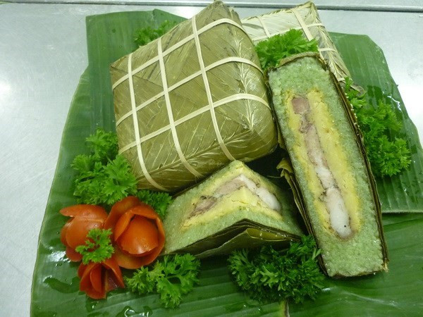 Celebran concurso de elaboración de pasteles de arroz vietnamitas en Singapur ảnh 1