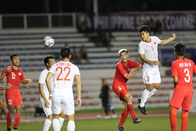 SEA Games 30: Vietnam da paso hacia semifinales tras vencer 1-0 a Singapur ảnh 1
