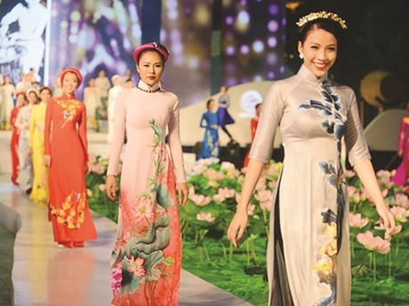 Honran belleza de Ao Dai, traje tradicional de mujeres vietnamitas ảnh 1 Honran belleza de Ao Dai, traje tradicional de mujeres vietnamitas ảnh 1