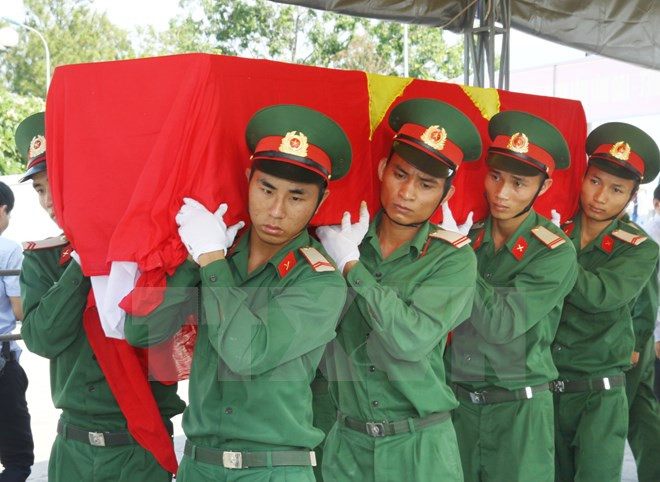 Repatrían restos de combatiente vietnamita caído en Laos ảnh 1 Repatrían restos de combatiente vietnamita caído en Laos ảnh 1
