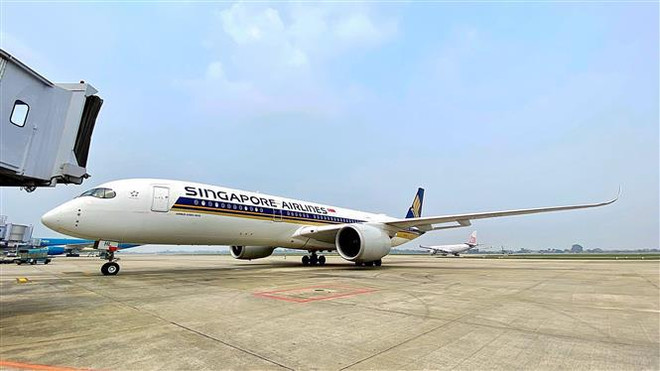 Vietnam acoge primer vuelo de viajeros foráneos tras reapertura completa del turismo ảnh 4