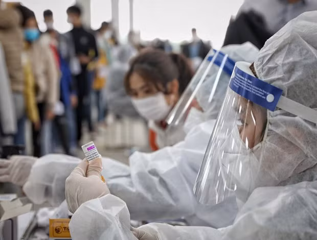 Promulga Gobierno de Vietnam programa de prevención y control del COVID-19 para 2022-2023 ảnh 1