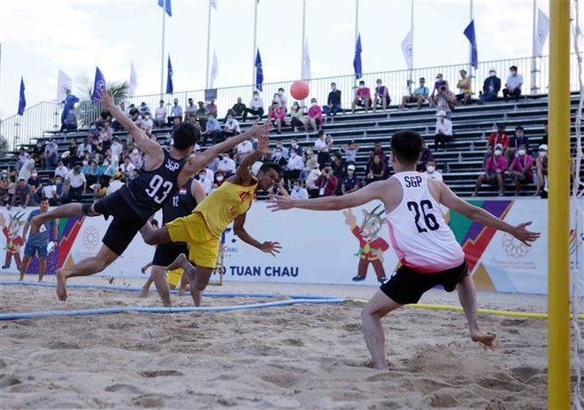 SEA Games 31: Selección vietnamita de balonmano playa vence con autoridad a Singapur ảnh 1 SEA Games 31: Selección vietnamita de balonmano playa vence con autoridad a Singapur ảnh 1