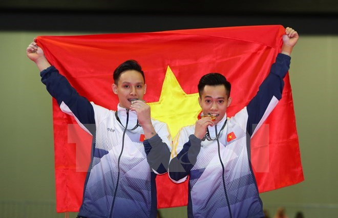 SEA Games 29: Gimnastas vietnamitas dominan prueba de barras asimétricas ảnh 1 SEA Games 29: Gimnastas vietnamitas dominan prueba de barras asimétricas ảnh 1