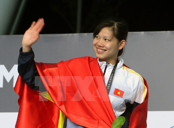 Vietnam mantiene segunda posición en medallero de SEA Games 29 ảnh 1