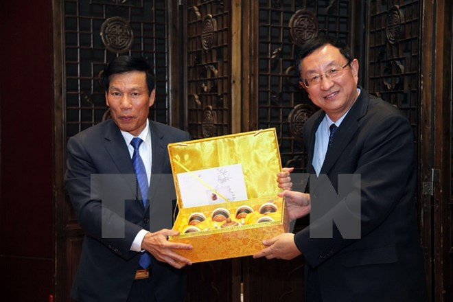 Exposición de pinturas resalta similitud en tradiciones culturales Vietnam – China ảnh 1 Exposición de pinturas resalta similitud en tradiciones culturales Vietnam – China ảnh 1