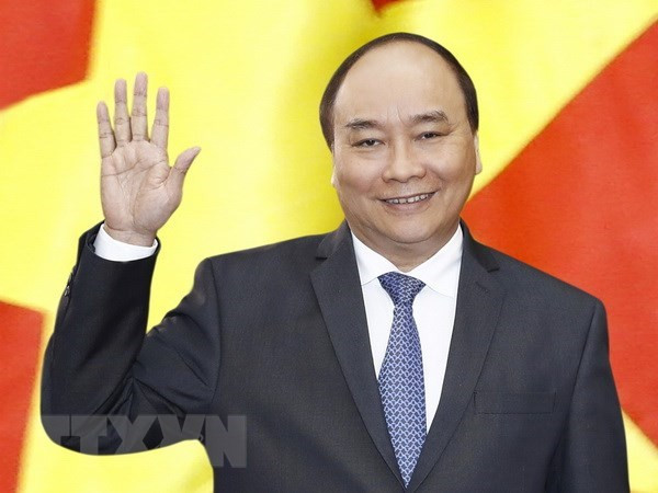Premier vietnamita mantuvo encuentros con dirigentes partidista y estatal de Laos ảnh 1 Premier vietnamita mantuvo encuentros con dirigentes partidista y estatal de Laos ảnh 1