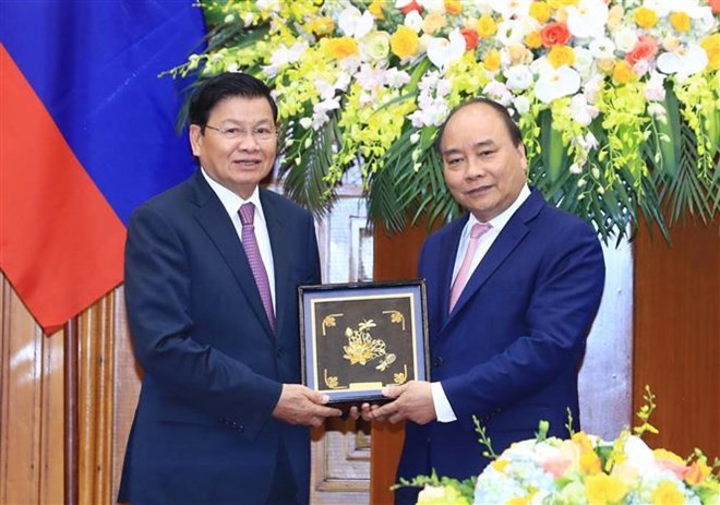 Premieres de Vietnam y Laos se entrevistan al margen del FEM- ASEAN ảnh 1 Premieres de Vietnam y Laos se entrevistan al margen del FEM- ASEAN ảnh 1