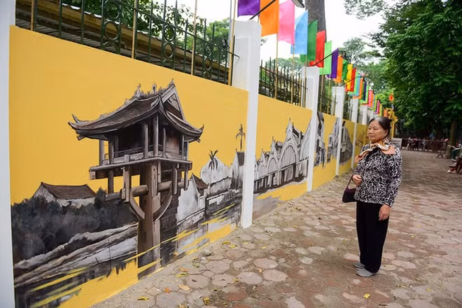 Frescos reproducen ambiente de Hanoi antigua ảnh 1