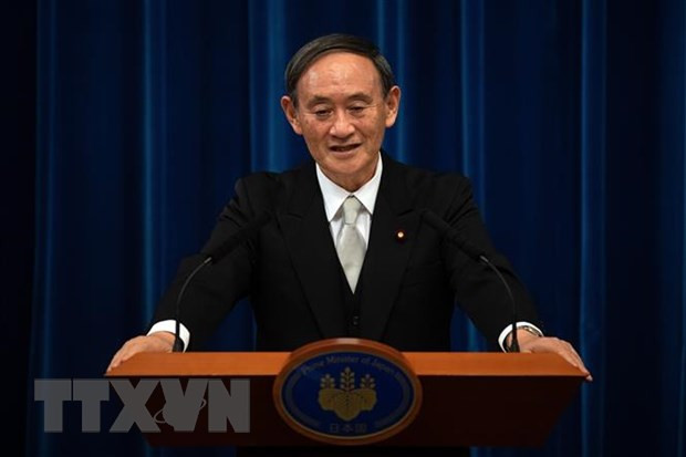 Inicia primer ministro japonés visita oficial a Vietnam ảnh 1