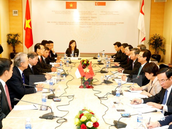 Concluye premier vietnamita visita a Malasia y Singapur ảnh 1 Concluye premier vietnamita visita a Malasia y Singapur ảnh 1