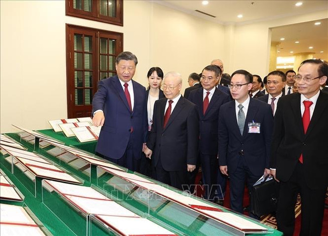 Prensa laosiana destaca visita de máximo dirigente chino a Vietnam ảnh 1 Prensa laosiana destaca visita de máximo dirigente chino a Vietnam ảnh 1