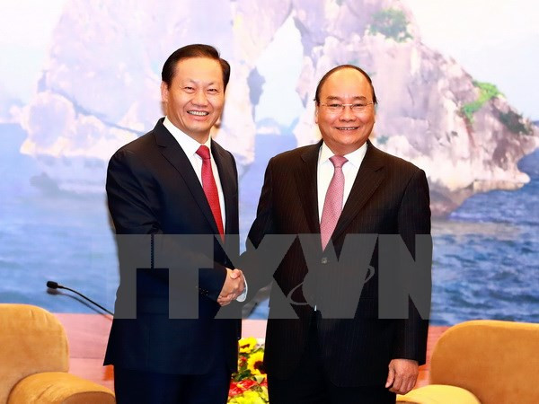 Premier vietnamita recibe a líder de región autónoma china de Zhuang ảnh 1 Premier vietnamita recibe a líder de región autónoma china de Zhuang ảnh 1