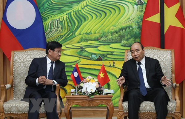 Primeros ministros de Vietnam y Laos discuten orientaciones estratégicas en desarrollo de nexos bilaterales ảnh 1 Primeros ministros de Vietnam y Laos discuten orientaciones estratégicas en desarrollo de nexos bilaterales ảnh 1