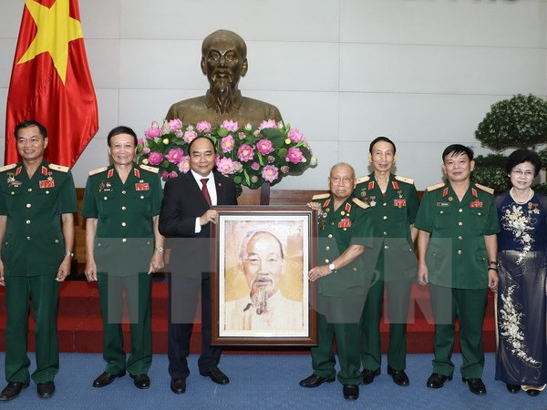 Premier vietnamita dialoga con veteranos en campo de batalla de Truong Son ảnh 1 Premier vietnamita dialoga con veteranos en campo de batalla de Truong Son ảnh 1