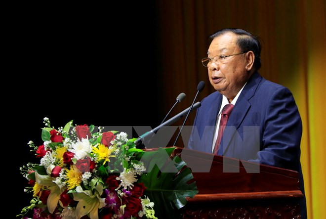 Dirigentes vietnamitas felicitan a secretario general de PPRL y presidente de Laos por su 80 cumpleaños ảnh 1 Dirigentes vietnamitas felicitan a secretario general de PPRL y presidente de Laos por su 80 cumpleaños ảnh 1