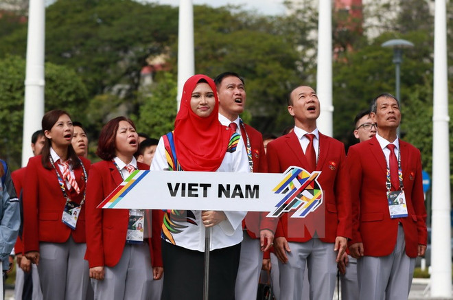 Izada bandera nacional de Vietnam en SEA Games 29 en Malasia ảnh 1