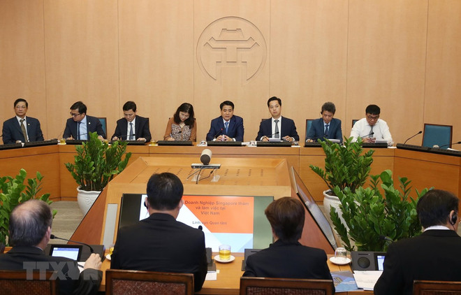 Exploran empresarios singapurenses oportunidades de cooperación en Hanoi ảnh 1 Exploran empresarios singapurenses oportunidades de cooperación en Hanoi ảnh 1