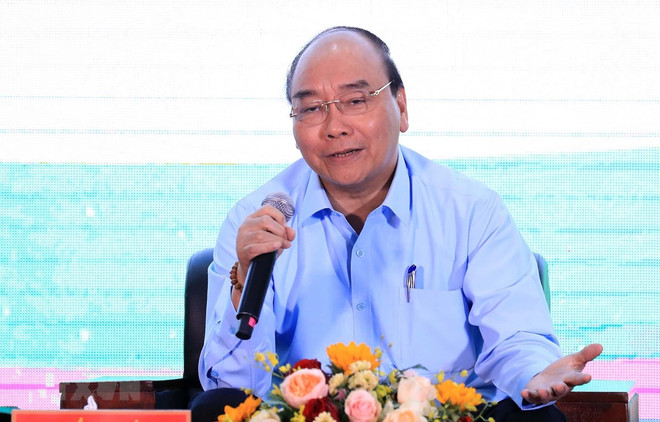 Dialoga primer ministro de Vietnam con agricultores nacionales ảnh 1 Dialoga primer ministro de Vietnam con agricultores nacionales ảnh 1