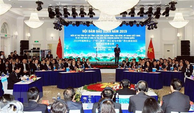 Impulsan cooperación entre localidades vietnamitas y la región autónoma china de Guangxi ảnh 1 Impulsan cooperación entre localidades vietnamitas y la región autónoma china de Guangxi ảnh 1