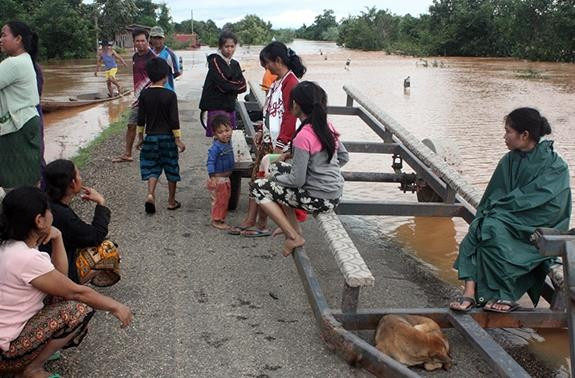 Vietnam expresa solidaridad con Laos ante pérdidas provocadas por las inundaciones ảnh 1