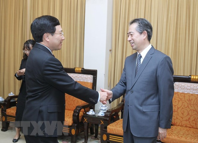 Vicepremier y canciller de Vietnam aboga por mantener intercambio de delegaciones con China ảnh 1 Vicepremier y canciller de Vietnam aboga por mantener intercambio de delegaciones con China ảnh 1