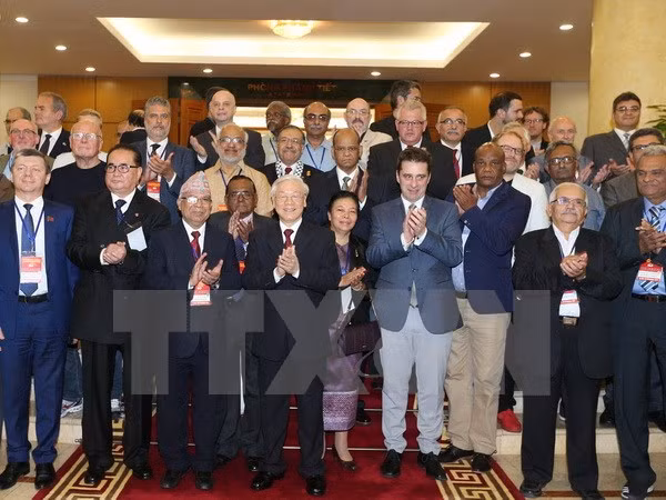 Delegados internacionales valoran logros de renovación de Vietnam ảnh 1