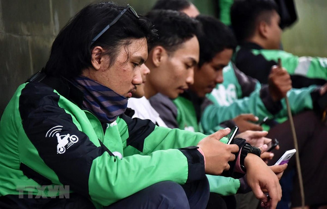 Impone Malasia multa por 20 millones de dólares a la compañía transportista Grab ảnh 1