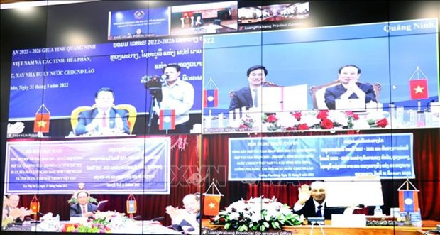 Fortalecen cooperación entre localidades de Vietnam y Laos ảnh 1 Fortalecen cooperación entre localidades de Vietnam y Laos ảnh 1