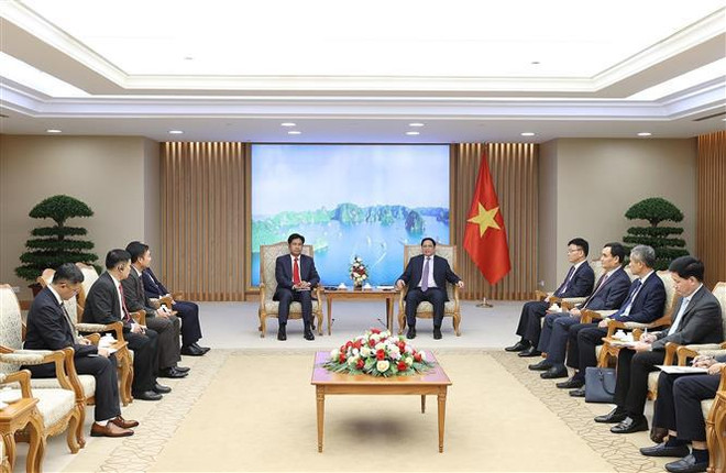 Premier vietnamita recibe a ministro de Justicia de Laos ảnh 2 Premier vietnamita recibe a ministro de Justicia de Laos ảnh 2