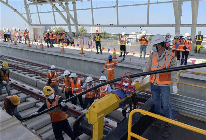 Instalan sistema de electrificación para línea de metro Ben Thanh-Suoi Tien ảnh 1 Instalan sistema de electrificación para línea de metro Ben Thanh-Suoi Tien ảnh 1