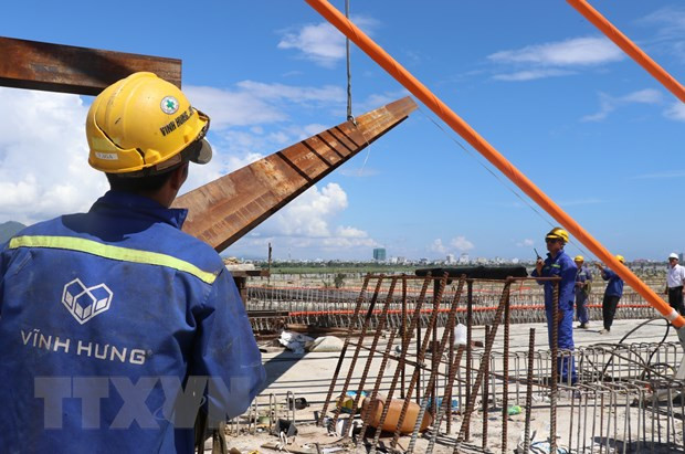 Especialistas singapurenses pronostican crecimiento económico de Vietnam de 2,9 por ciento en 2020 ảnh 1